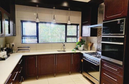 Olympus AH House | Green Forest Executive Suites