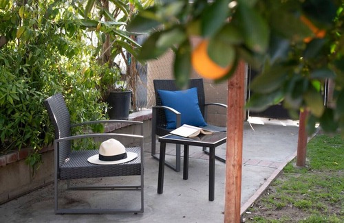 Azusa House | Green Oasis Retreat: 3 Bedrooms, Game Room with Air Hockey, Backyard Paradise with Cornhole, Gazebo, BBQ, and Eclectic Patio Delights