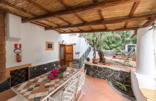 Leni Apartment | Green studio apartment in Salina Aeolian Islands 900 meters from the sea CIR:19083037C100309