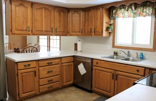 Escanaba House | Greenwood Getaway: Dog-friendly! Don't miss the fall colors here!