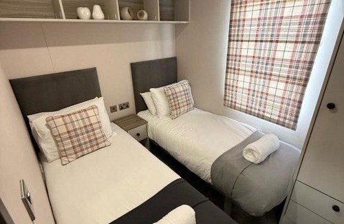Malton House | Grey Goose Lodge with hot tub at Brickyard Lakes