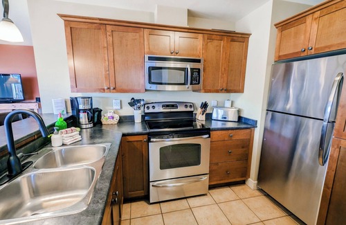 Golden Condo | Grizzly Heights: 2-bedroom mountain condo with hot tub