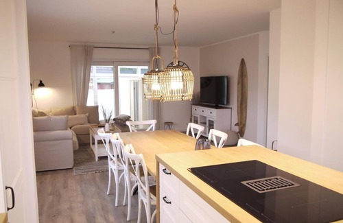 Haffkrug Apartment | Großzügige Wohnung auf 125qm mit Terrasse, Wintergarten, Sauna und Kamin