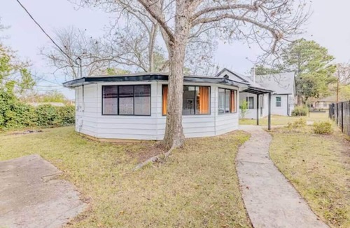 West End House | Groovy Getaway with Fenced Yard
