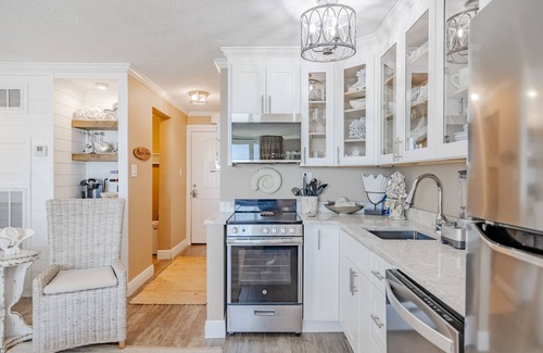 Panama City Beach Condo | Ground Floor Beachside Studio Condo with Patio and Free Beach Service.