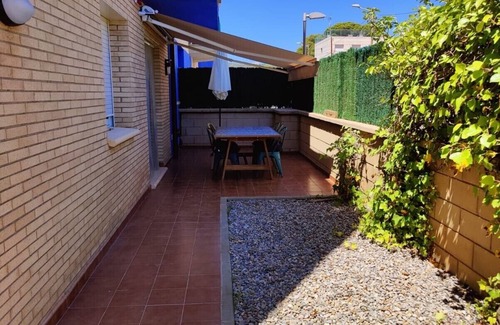 Els Griells Apartment | Ground floor with large terrace next to the beach