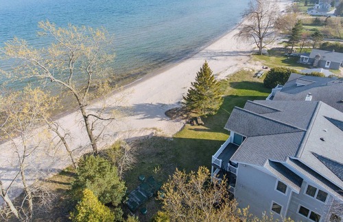 Jacksonport Condo | Ground Level Sand Beach Condo - Only 2 Fall Weekends Still Available!