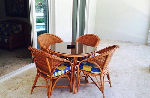 El Batey Apartment | Groundfloor 2BD 2BTH condo, guest-friendly, pool, near sandy beach/shops