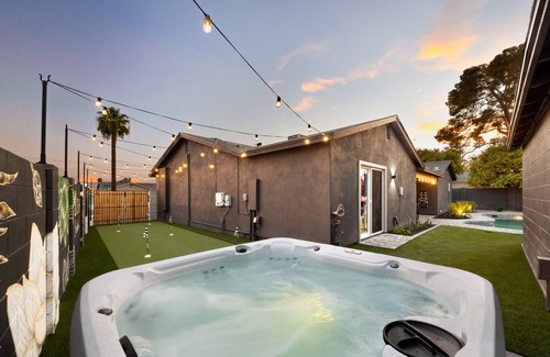 New Papago Parkway House | Group Fun HQ with Hot Tub + Bar, Heated Pool, Game Room & Lounge Near Old Town