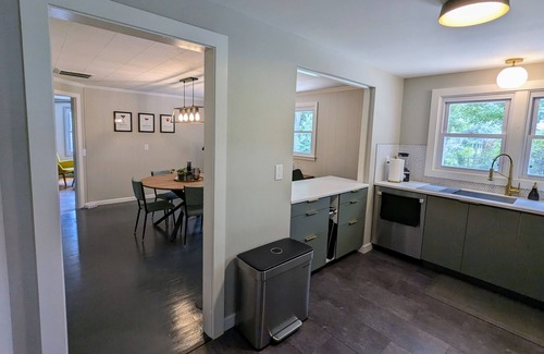 Swannanoa House | Grovemont Retro Retreat A pet-friendly home in Asheville, with a fenced yard & fire pit.