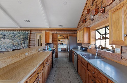 Kerrville House | Guadalupe Bluff Log Cabin - Hot tub - Guadalupe River View