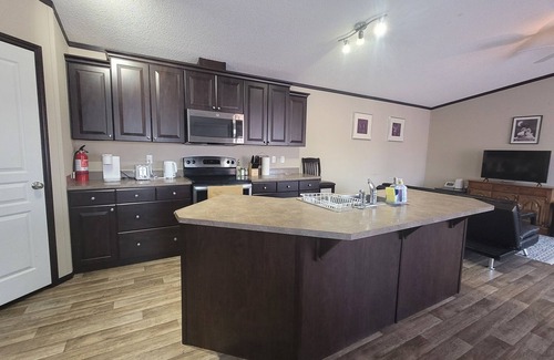 Stettler House | Guest suite in town-2 bedrooms/private kitchen