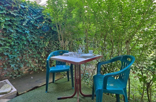 Silly-Gallieni Apartment | GuestReady - Cozy quiet studio with garden level