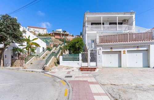 Playas del Palo Apartment | GuestReady - Terrace Malaga view