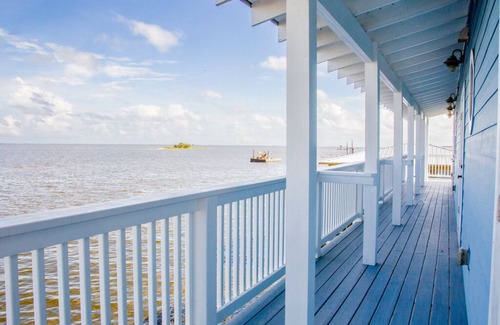 Horseshoe Beach House | Gulf front location with amazing sunrise view-direct access on deep water canal!