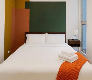 Near West Side Apartment | Gym Garage Parking Balcony Sleeps 4