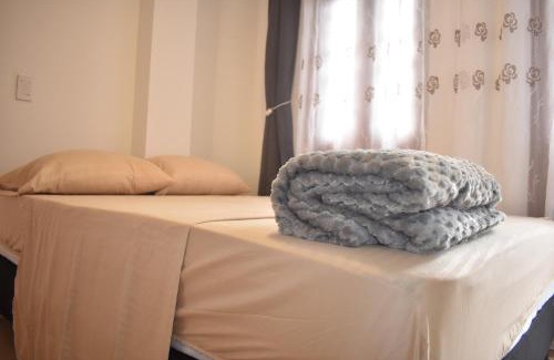 La Ceja House | Habitación con cama doble y balcon privado cerca del parque principal