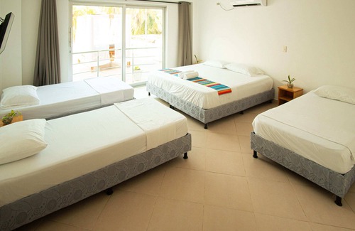 Covenas Hotel | Habitación Superior Familiar Con Balcón Cerca A La Playa