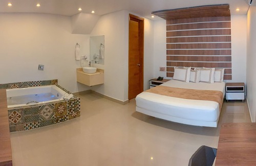 Laureles Hotel | Habitacion Junior Suite Con Jacuzzi En Laureles Estadio