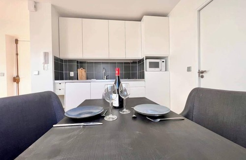 Quartier du Faubourg-Montmartre Apartment | Habitat Parisien -1BR-1BA with Parisian rooftop view