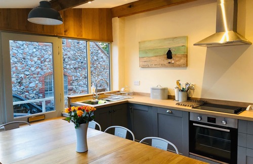 Walsingham House | Half Moon House is a beautifully renovated brick and flint cottage near Wells.