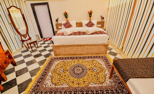 Amar Sagar Pol Resort | HAMIRGARH LUXURIOUS DESERT CAMP & RESoRT
