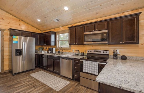 Sevierville Cabin | Happy Bear: Wooded Views, Fire-Pit, Game Room & Hot-Tub, Close to Attractions