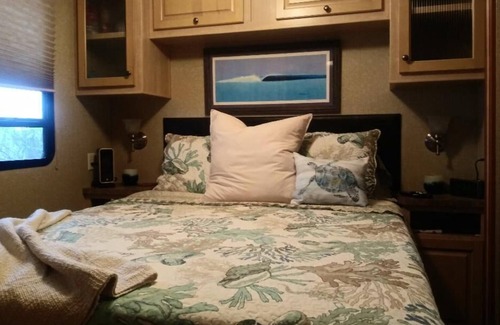 Sandbridge Cottage | Happy Place: sunset view of Back Bay from the sofa and deck- 5 min walk to Beach