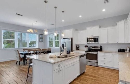 Holmes Beach House | Harbor Haven! Pool with with water slide! Sleeps 14!