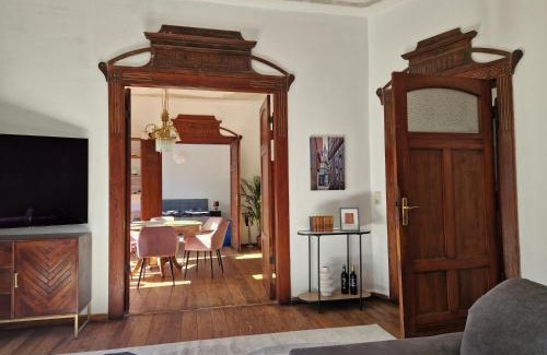 Quedlinburg Apartment | Harziano in der Kaiser-Otto-Straße - Stilvolle Gründerzeitwohnungen mit Kachelöfen, Wintergarten & viel Platz zum Entspannen