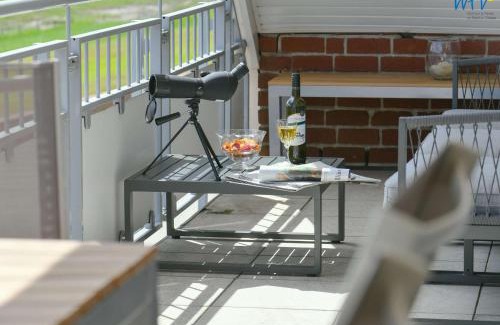 Juist Apartment | Haus Klabautermann - Ferienwohnung Karin's Nest