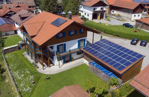 Hopfen am See Condo | Haus Vöhringer - Modern vacation apartment in a top location directly on Lake Hopfensee in the Allgäu