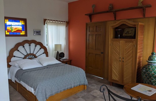 La Ribera Bed & Breakfast | HdP: Room #3 Library with one queen size bed and one sofa bed in separate room