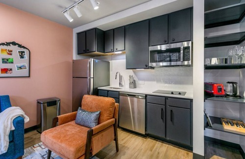 Central Business District Hotel | Heart of NOLA 2BR Bliss Condo with 2 Balconies