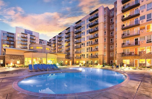 Seaside Gilbert District Resort | Heated outdoor swimming pool and hot tub!