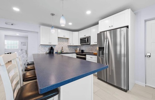 South Island Apartment | Heated Pool Home steps to the beach