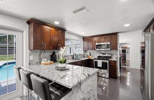 Tampa House | Heated Pool- Outdoor oasis! NEW GAME ROOM! +Grill! 4BR/3BA