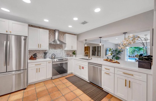 Coral Ridge House | Heated pool/Quiet Neighborhood/Family Vacation/Escape Key