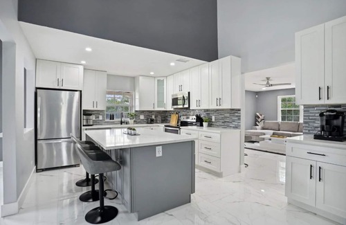 Lake Clarke Shores House | Heated Pool/Spa Getaway -10 Minutes from Downtown WPB & Palm Beach Island!