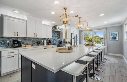 Indian Rocks Beach House | Heated Pool Waterfront Boat Slip Pets Games 7BR