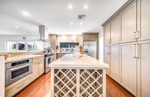 Garden Isles House | Heated Pool! WaterFront Home! 1 Mile To Beach!