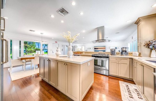 Garden Isles House | Heated Pool! WaterFront Home! 1 Mile To Beach!