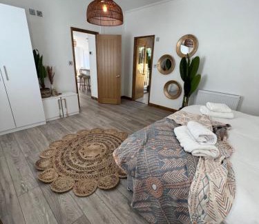 Storwood House | Hedgehog Lodge at Owlet Hideaway - with Hot Tub, near York