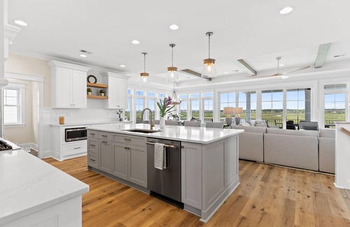 Sunset Beach House | Here Comes the Sunset is a gorgeous home with incredible views of the Sunset Beach Intercoastal waterway and just a short walk to the beach!
