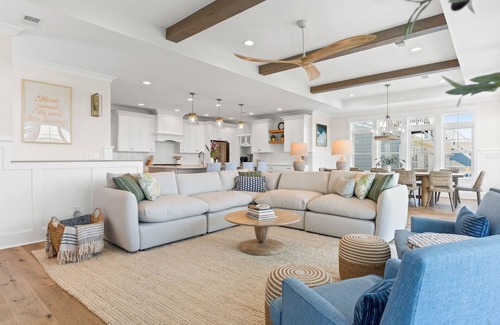Sunset Beach House | Here Comes the Sunset is a gorgeous home with incredible views of the Sunset Beach Intercoastal waterway and just a short walk to the beach!