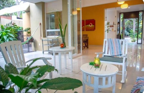 Comala House | Hermosa casa 3 recámaras rodeada de naturaleza con piscina compartida, WiFi, AC.