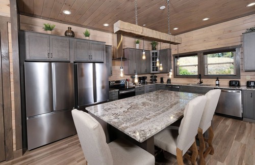 Sevierville Cabin | Hibernation Hideaway - Private indoor pool, theater room, hot tub, games, and more!