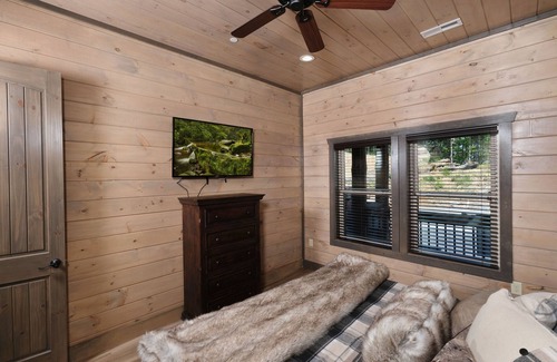 Sevierville Cabin | Hibernation Hideaway - Private indoor pool, theater room, hot tub, games, and more!