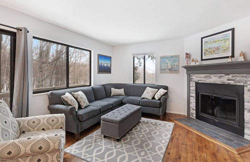 Harbor Springs Condo | Hideaway Valley condo w/ walkout patio & shared pool and tennis!