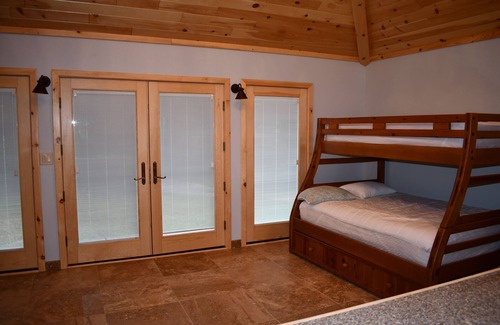 Higgins Lake House | Higgins Lake frontage Small Guest House With Shared Beach, Yard and Dock.